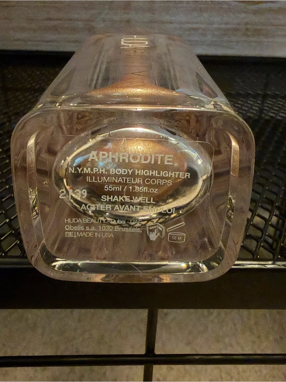 HUDA BEAUTY Aphrodite N.Y.M.P.H. Body Highlighter in Rose Gold